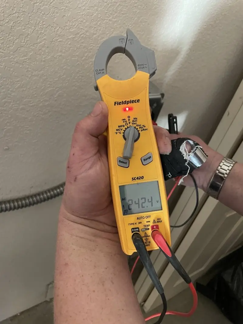 Voltage testing with clamp meter during Hot Tub / Pool Electrical Wiring in Williamsport